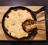 Elk pot pie in a pan