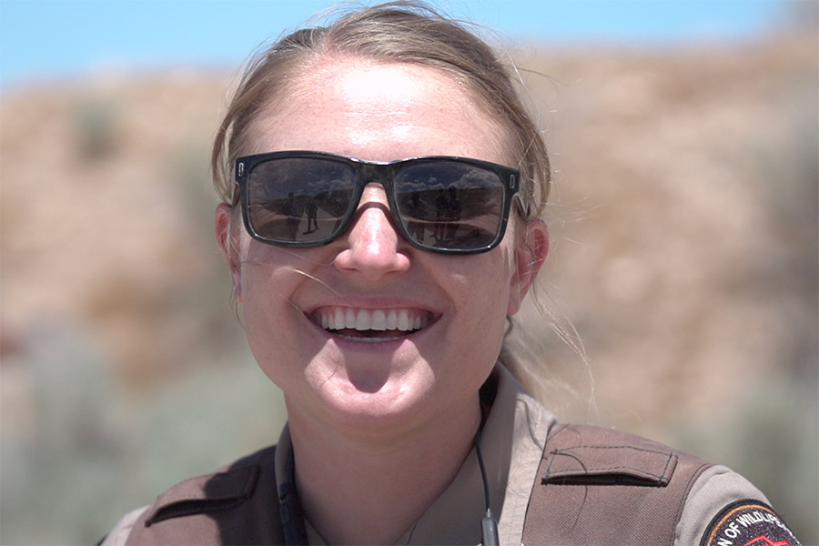 Female Utah DWR conservation officer, smiling